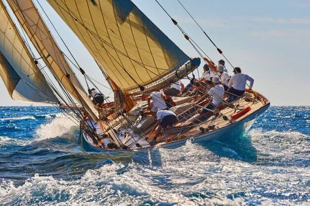 How Do You Steer A Sailboat Using The Rudder And Sails?